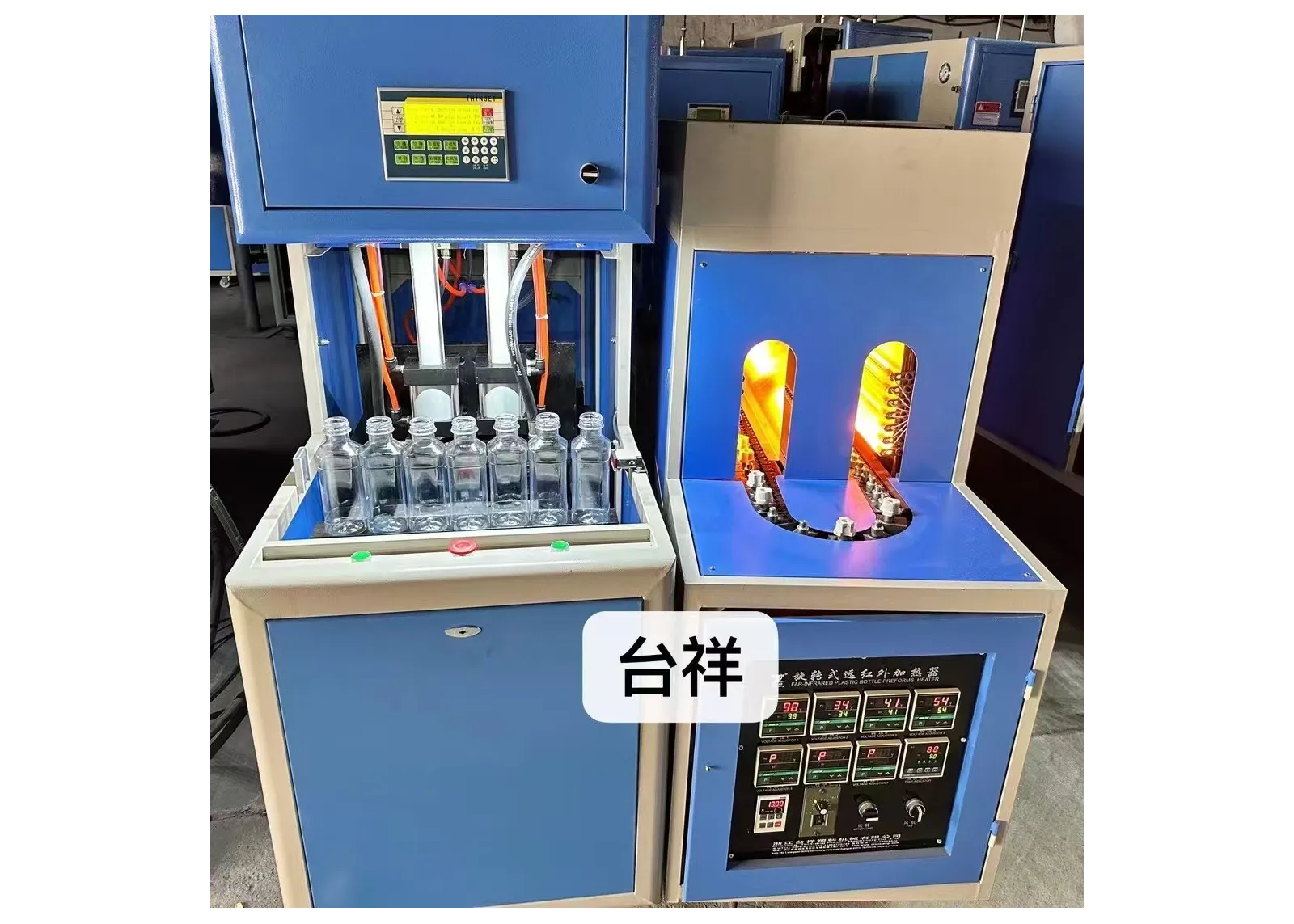 3升一出二半自动吹瓶机    台州市黄岩台祥塑料机械有限公司