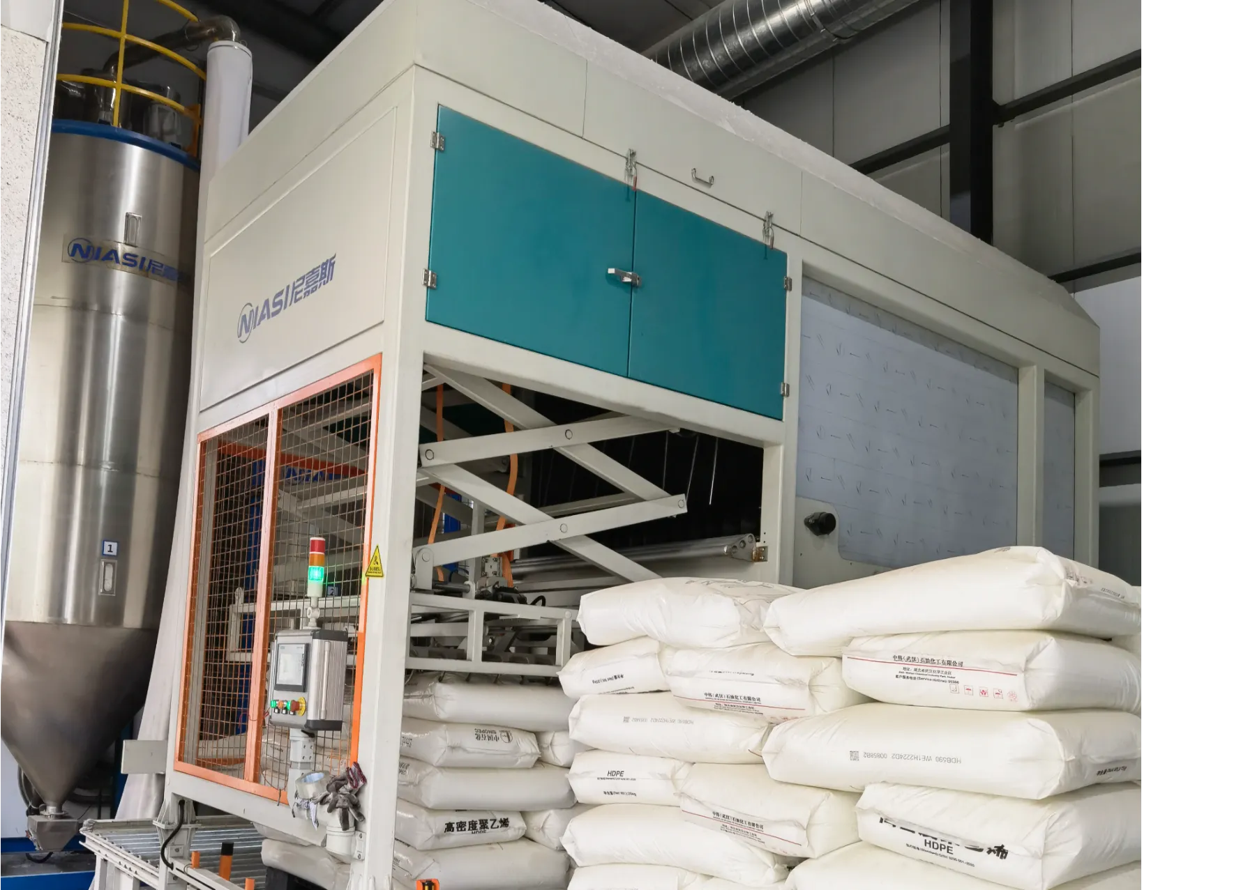 自动拆包机（逐层拆包机）    东莞市尼嘉斯塑胶机械有限公司